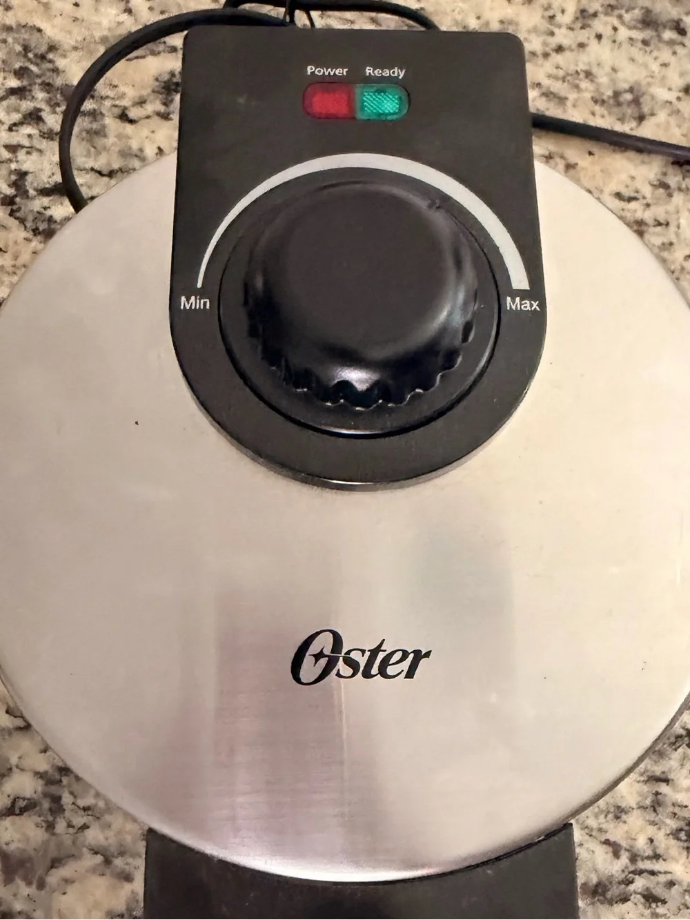 Oster Black Round 4-Section Nonstick Waffle Maker